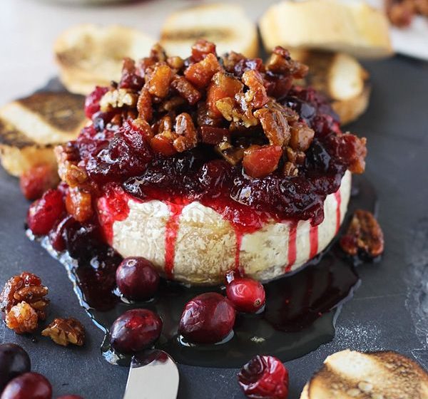 Oozy baked camembert with tart and zingy balsamic roasted cranberries